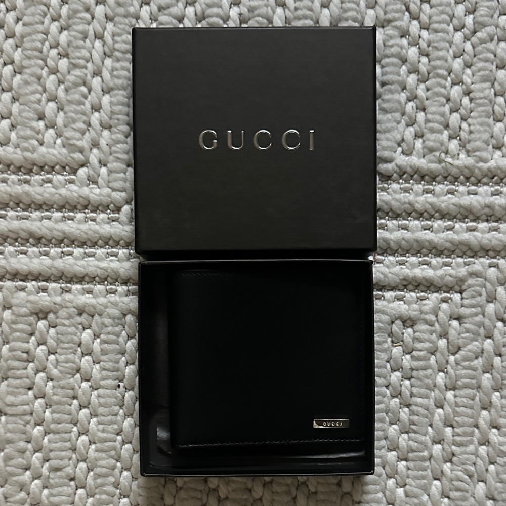 Gucci Black Leather wallet brand new in box!
